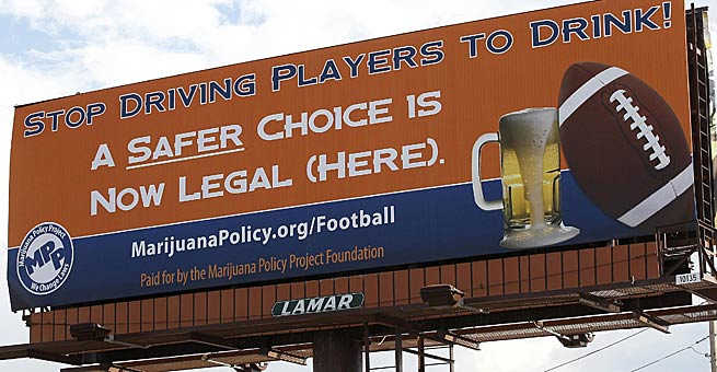 This billboard at the season opener urged the NFL to loosen its policy on marijuana use by players.
